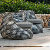 Comfortable Dark Gray Outdoor Patio Rattan Armchair with Cushions for Relaxing Outdoors
